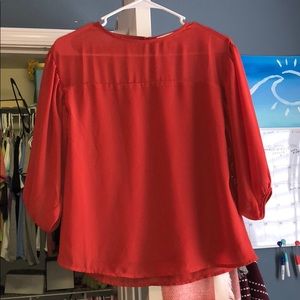 Burnt orange colored top